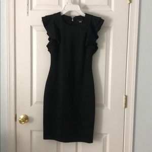 Black knee length flutter sleeve dress